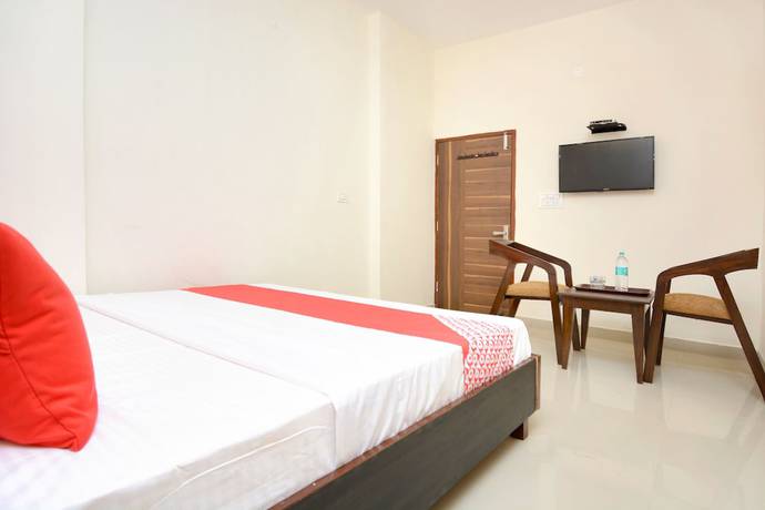 Imagen de la habitación del Hotel OYO 22993 Ozas Grand. Foto 7