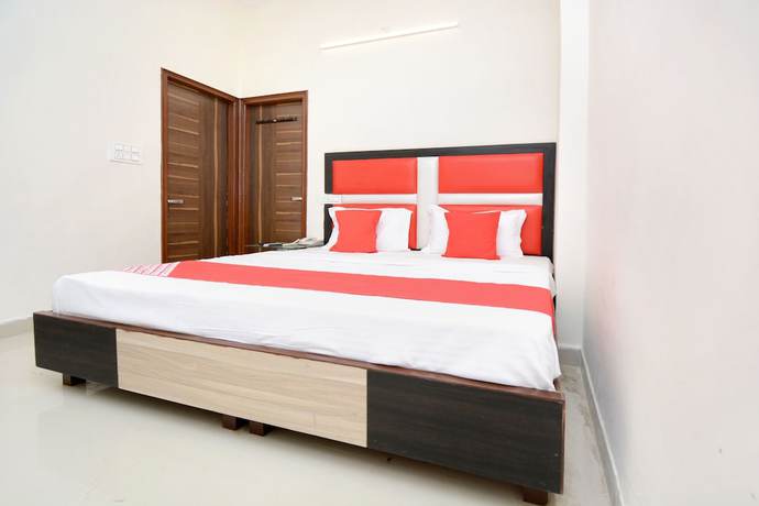 Imagen de la habitación del Hotel OYO 22993 Ozas Grand. Foto 8