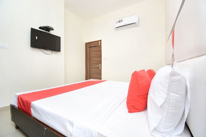Imagen de la habitación del Hotel OYO 22993 Ozas Grand. Foto 9