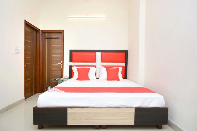 Imagen de la habitación del Hotel OYO 22993 Ozas Grand. Foto 10