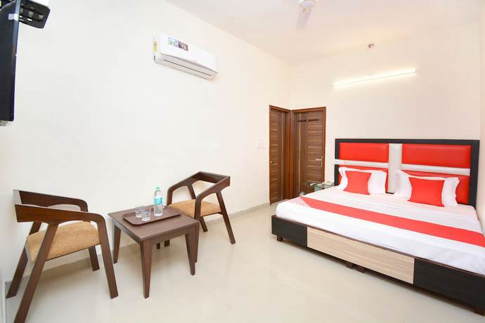 Imagen de la habitación del Hotel OYO 22993 Ozas Grand. Foto 11