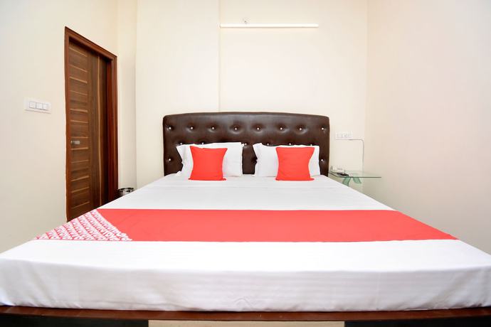Imagen de la habitación del Hotel OYO 22993 Ozas Grand. Foto 12