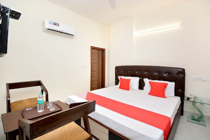 Imagen de la habitación del Hotel OYO 22993 Ozas Grand. Foto 13