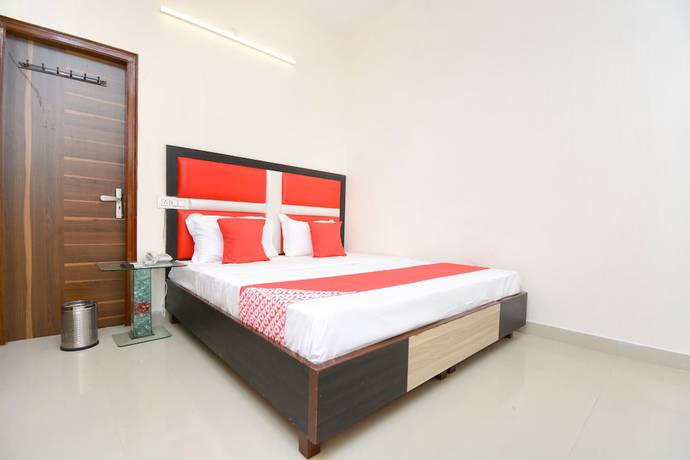 Imagen de la habitación del Hotel OYO 22993 Ozas Grand. Foto 14