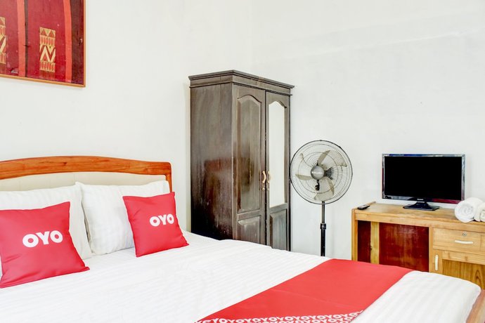 Imagen de la habitación del Hotel OYO 2301 Hocky Guest House. Foto 4