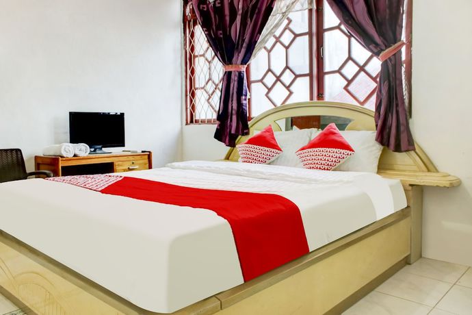 Imagen general del Hotel OYO 2301 Hocky Guest House. Foto 1