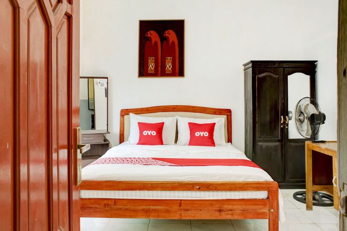 Imagen de la habitación del Hotel OYO 2301 Hocky Guest House. Foto 6