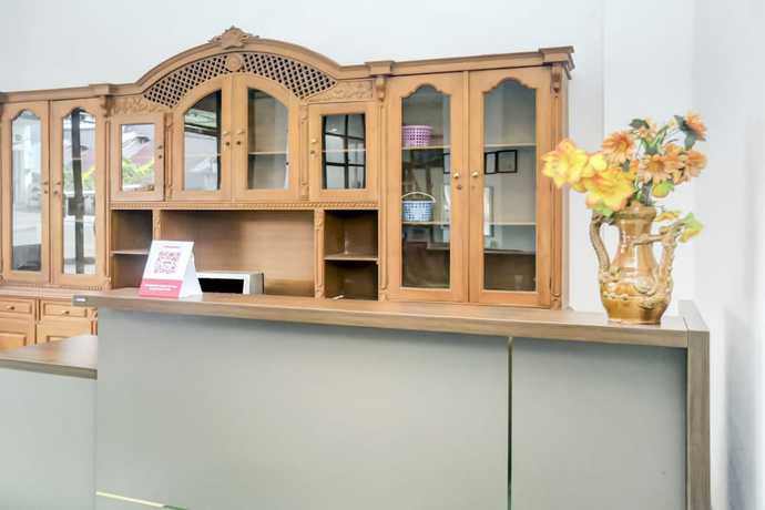 Imagen de los interiores del Hotel OYO 2301 Hocky Guest House. Foto 18