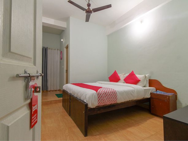 Imagen de la habitación del Hotel OYO 23107 Rasha Residency. Foto 7