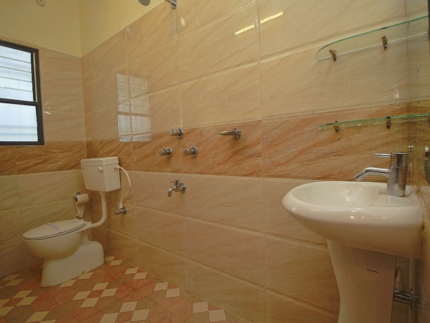 Imagen de la habitación del Hotel OYO 23390 Ruposhi Bangla Eco Resort. Foto 13