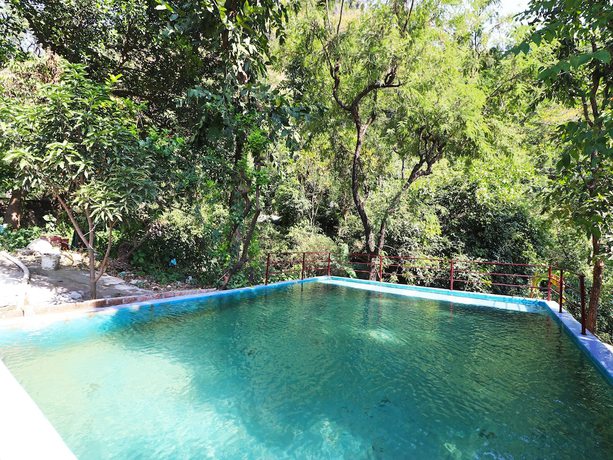 Imagen de la piscina del Hotel OYO 23439 Tapovan Heights Camp and Resort. Foto 20