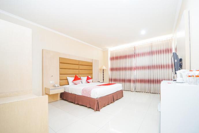 Imagen de la habitación del Hotel OYO 235 Maumu Hotel Lounge. Foto 3