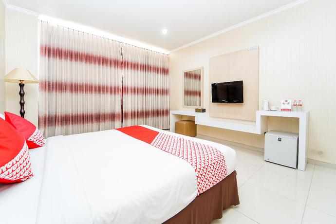 Imagen de la habitación del Hotel OYO 235 Maumu Hotel Lounge. Foto 5