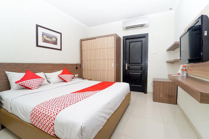 Imagen de la habitación del Hotel OYO 235 Maumu Hotel Lounge. Foto 6