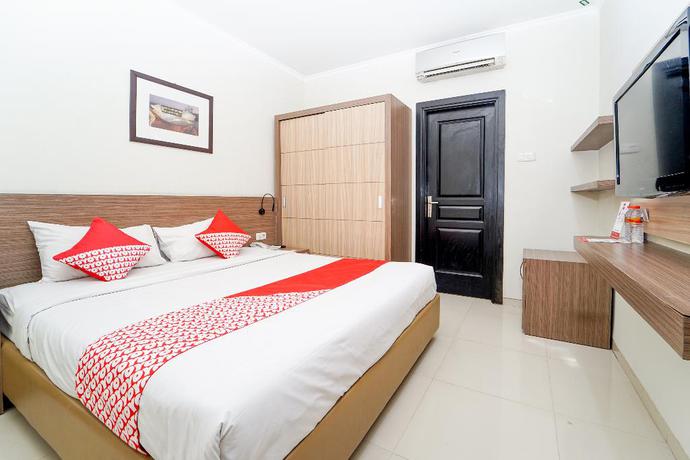 Imagen de la habitación del Hotel OYO 235 Maumu Hotel Lounge. Foto 8