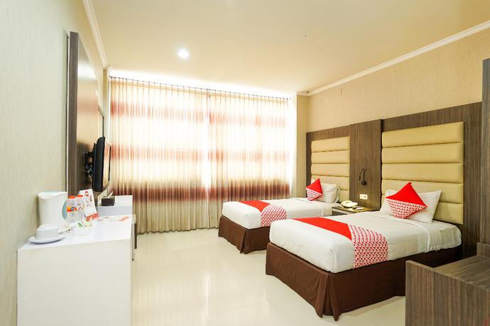 Imagen de la habitación del Hotel OYO 235 Maumu Hotel Lounge. Foto 11