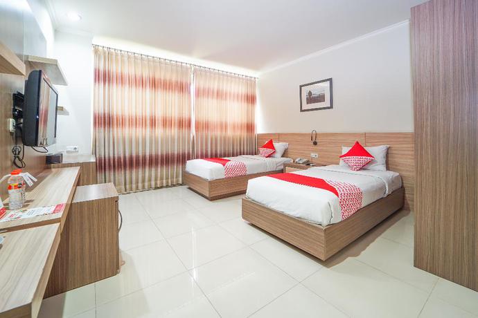 Imagen de la habitación del Hotel OYO 235 Maumu Hotel Lounge. Foto 14