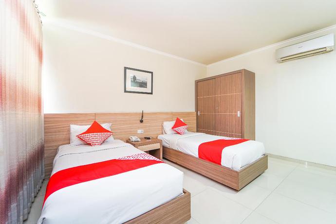 Imagen de la habitación del Hotel OYO 235 Maumu Hotel Lounge. Foto 16