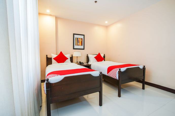Imagen de la habitación del Hotel OYO 236 Edmundo. Foto 4