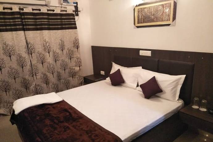 Imagen de la habitación del Hotel OYO 23668 The Hridhaan Regency. Foto 12