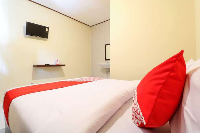 Imagen de la habitación del Hotel OYO 2367 Kenanga Homestay. Foto 5