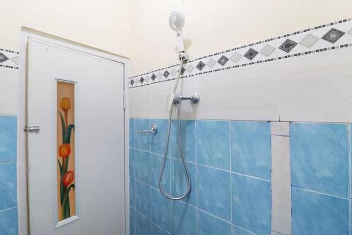Imagen de la habitación del Hotel OYO 2367 Kenanga Homestay. Foto 6