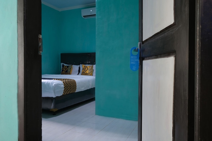 Imagen de la habitación del Hotel OYO 2389 Kostel 99. Foto 3