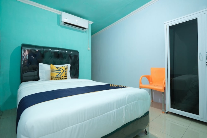 Imagen de la habitación del Hotel OYO 2389 Kostel 99. Foto 4