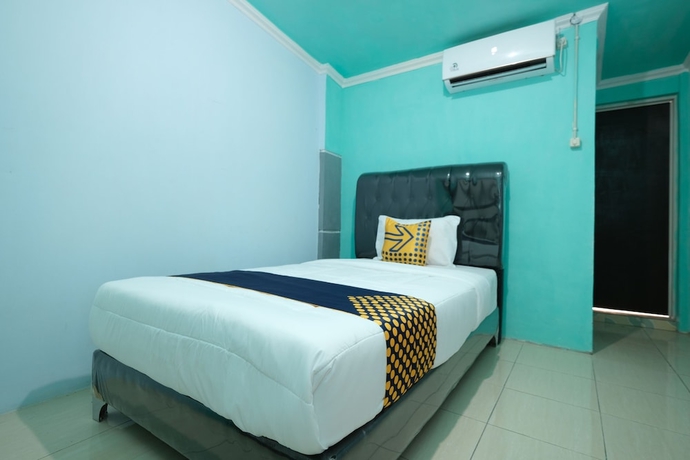 Imagen de la habitación del Hotel OYO 2389 Kostel 99. Foto 6