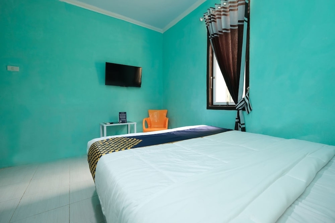 Imagen de la habitación del Hotel OYO 2389 Kostel 99. Foto 10