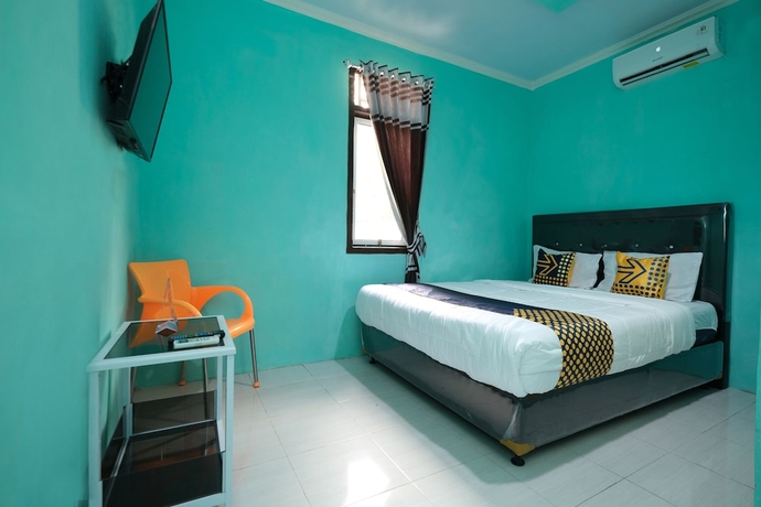 Imagen de la habitación del Hotel OYO 2389 Kostel 99. Foto 11