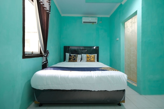 Imagen de la habitación del Hotel OYO 2389 Kostel 99. Foto 12