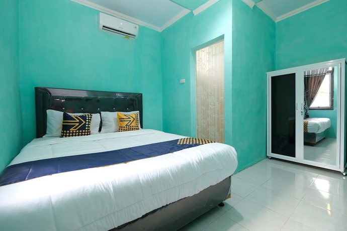 Imagen de la habitación del Hotel OYO 2389 Kostel 99. Foto 13