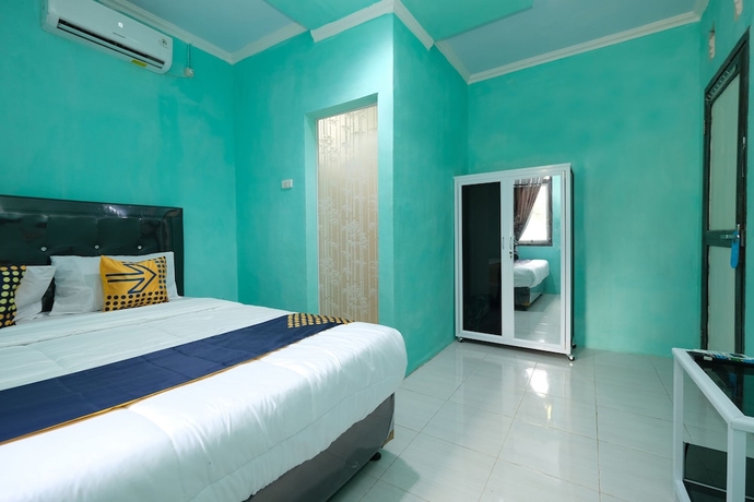 Imagen de la habitación del Hotel OYO 2389 Kostel 99. Foto 14