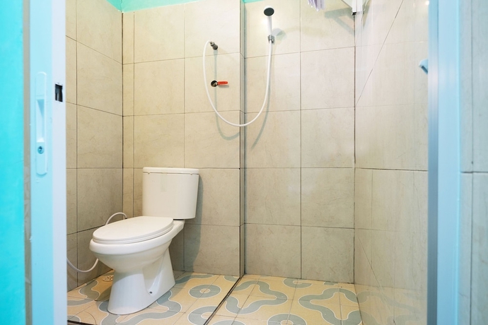 Imagen de la habitación del Hotel OYO 2389 Kostel 99. Foto 15