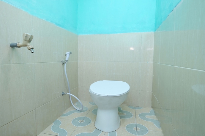 Imagen de la habitación del Hotel OYO 2389 Kostel 99. Foto 18