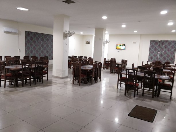 Imagen del bar/restaurante del Hotel OYO 24209 The Pearly Gate. Foto 2