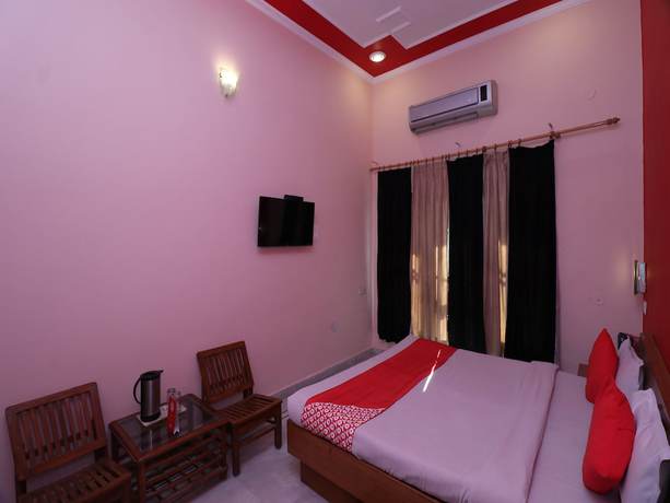 Imagen de la habitación del Hotel OYO 24340 Laxmi Palace. Foto 2