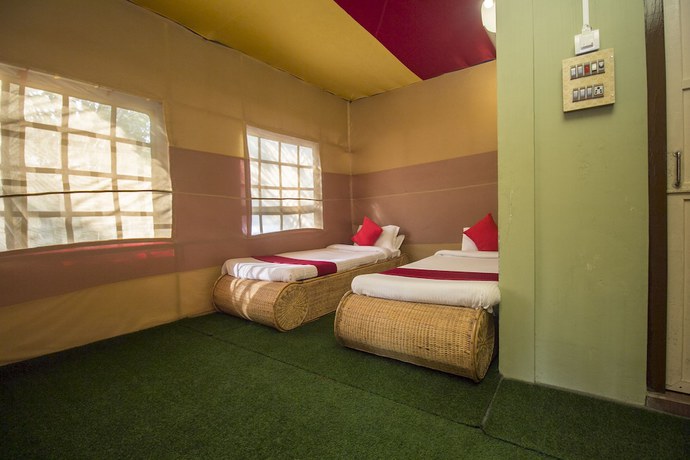 Imagen de la habitación del Hotel OYO 24391 Resort Gorumara Nest. Foto 11