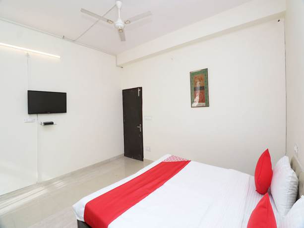 Imagen de la habitación del Hotel OYO 24466 Rio 7 Guest House. Foto 16