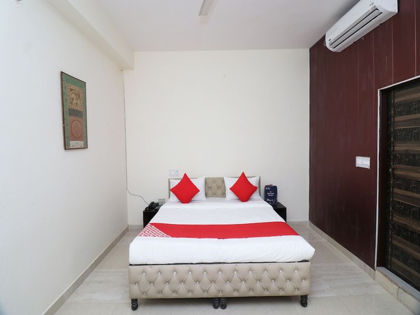 Imagen de la habitación del Hotel OYO 24466 Rio 7 Guest House. Foto 17