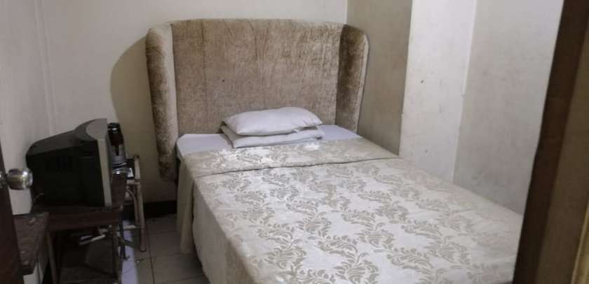 Imagen de la habitación del Hotel OYO 2452 Metro. Foto 5