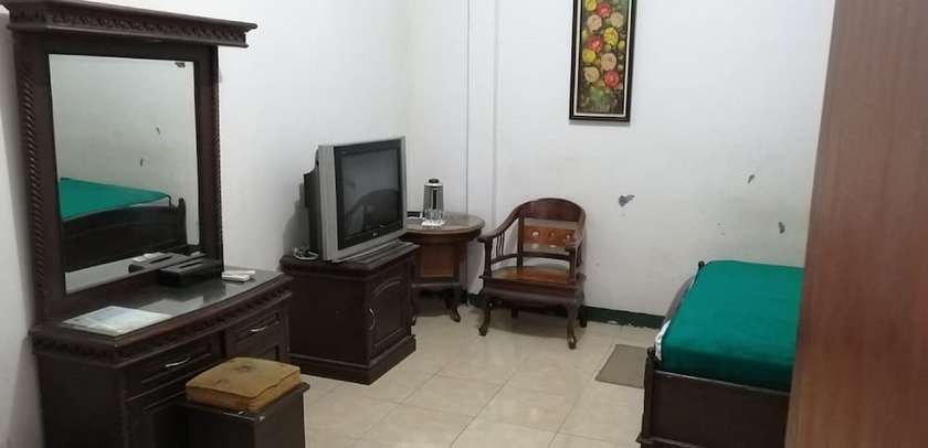 Imagen de la habitación del Hotel OYO 2452 Metro. Foto 6