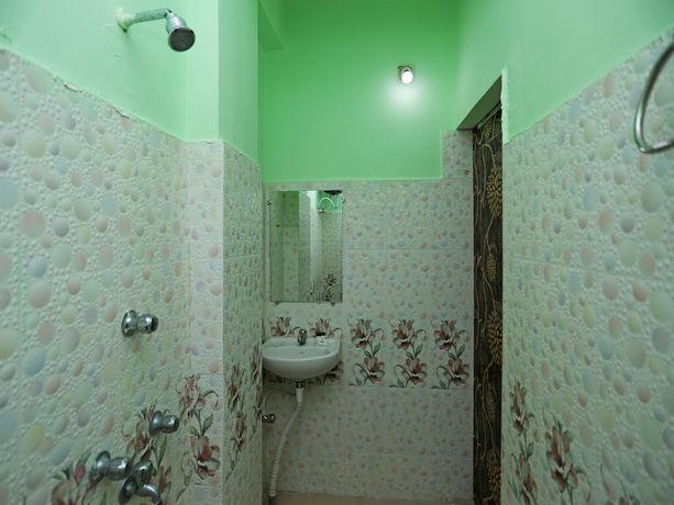 Imagen de la habitación del Hotel OYO 24642 Manorama Guest House. Foto 3