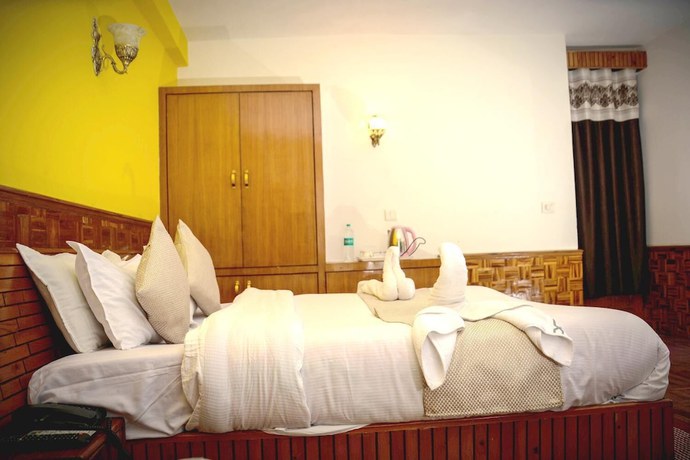 Imagen de la habitación del Hotel OYO 24832 Rajhans. Foto 2