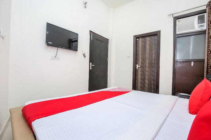 Imagen de la habitación del Hotel OYO 24851 R Continental. Foto 12
