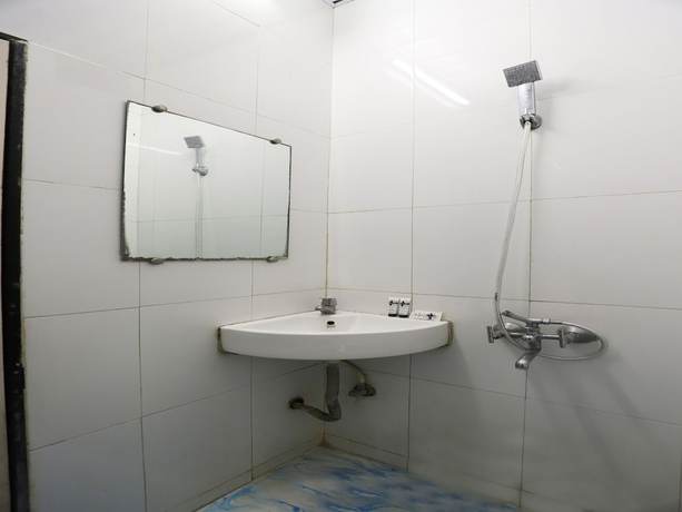 Imagen de la habitación del Hotel OYO 2494 Shree Plaza. Foto 18