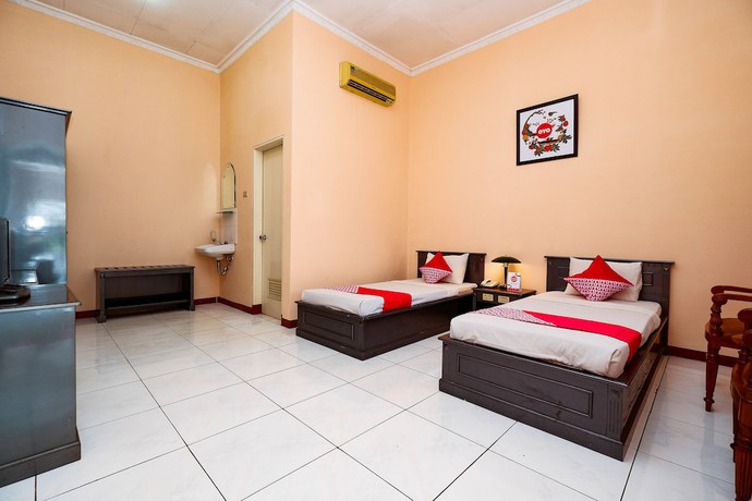 Imagen de la habitación del Hotel OYO 2495 Wijaya. Foto 2