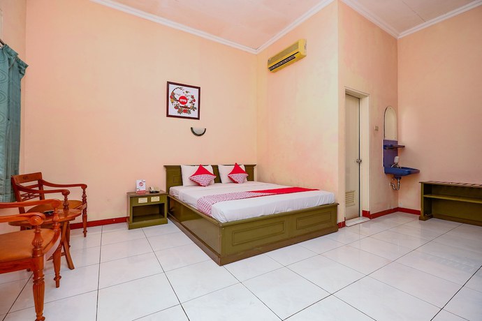 Imagen de la habitación del Hotel OYO 2495 Wijaya. Foto 12