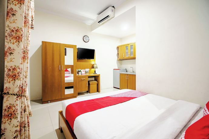 Imagen de la habitación del Hotel OYO 250 De\'gadri Ndalem. Foto 2